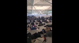 People camp at Stansted Airport, London, amid snow chaos