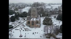 Arctic Blast aftermath: Drone shot shows snow-slammed church in Fairford, UK