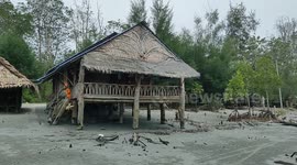 Orang Asli's (indigenous people) houses along seaside in Malaysia