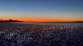 Watch as pancake ice forms on the Ottawa River during a stunning winter sunrise