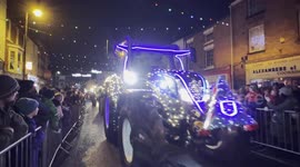 Catwalk of Christmassy tractors draws people to streets of Welshpool, Wales