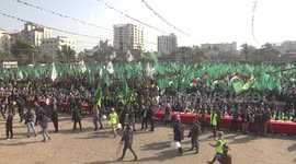 Hamas supporters gather in Gaza City to mark the 35th anniversary of the militant group