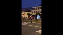 A lone protester faces down riot police close to Congress in Lima, Peru