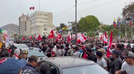 Protesters reduce 8 lane highway in Lima, Peru to one lane in protest outside the country’s congress building.