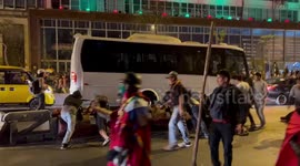 Protesters attempt to block main highway in Lima by moving street furniture