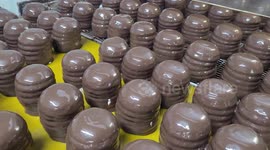 Palestinian workers prepare the vanilla candy known as 