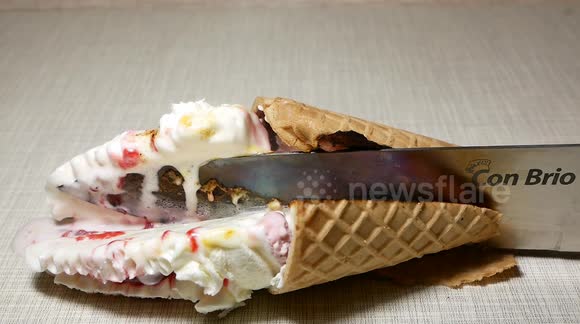 Oddly satisfying footage shows 1000-degree knife cutting through food