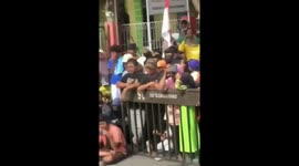 Fail! Man tries to climb the fence and gets stuck!