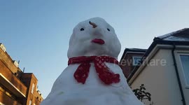 Giant 8 foot snowman survives melting in London's big freeze