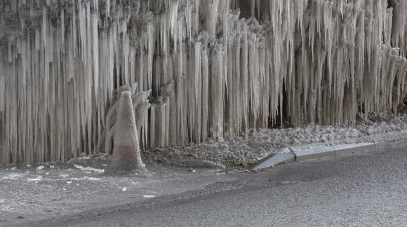 Burst water main creates spectacular ice formation in Gloucestershire