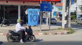 Fans celebrate Argentina World Cup win with giant Messi shirt at traffic light junction