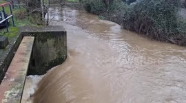 The River Uck in Uckfield East Sussex today in full flow today with flood warning issued down stream