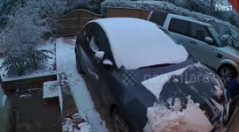 Schoolboy leaves dad's new car covered in scratches after clearing snow off bonnet with a SHOVEL