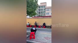 Dozens of patients in China receive IV drip outdoors during COVID-19 surge