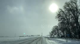 Snow plows clear the roads of Minnesota as dangerously cold conditions sweep through North America