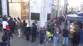 Shoppers queue outside London's Selfridges on Boxing Day
