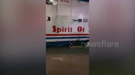 Driver rescued when car plunges into sea while boarding ferry in Indonesia