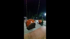 Men play GIANT drums during performance in Vietnam