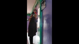 This spoiled cat like to climbs on its owner as it wants to go with it