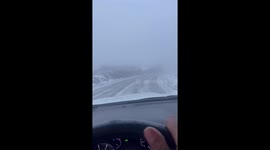 Snow and freezing fog covered the road in Saudi Arabia.