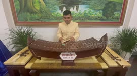 Cambodian man plays Jingle Bells on traditional Khmer 'Roneat ek' xylophone
