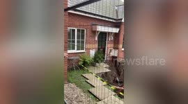 70ft sinkhole appears outside hom in Halesowen, UK