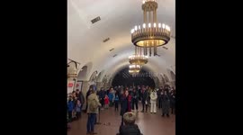 Ukrainians celebrate New Year spirit while sheltering from rocket barrage