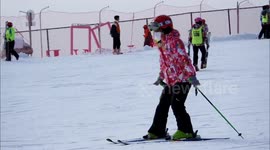 Tourists Ski At A Ski Resort in Yichang, China