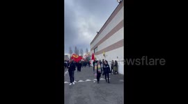 Members of the Kurdish community attend a funeral ceremony in Villiers-le-Bel, France