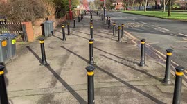 Residents baffled by bizarre stretch of 60 bollards erected outside a primary school in Birmingham