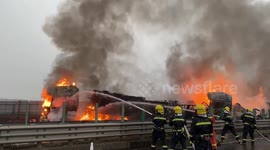 3-truck crash causes huge fire on highway in China
