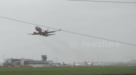 Plane taking off in Storm Desmond