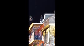 Tom Cruise falls while running across roof during filming
