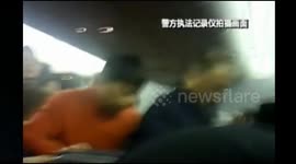 University professor causes chaos on plane, injuring three policemen