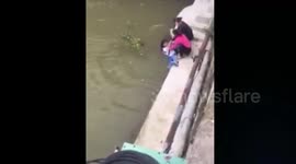 Mother threatens to throw daughter into river for not obeying her