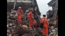 Rescuers search for survivors in China landslide