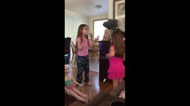 Two sisters, aged 4 and 8, face off in epic rap battle