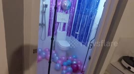 Dad uses coloured toilet water in hilarious low-budget gender reveal