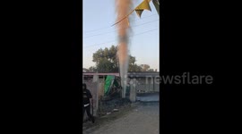 Gas leakage burst upwards the sky while drilling for water pump in Imphal, India
