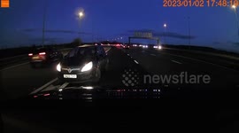 Watch moment driver on busy M56 motorway loses control and spins car across multiple lanes