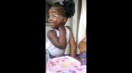 Kids putting on makeup, cosmetics while granny is amused in Witbank Mpumalanga South Africa