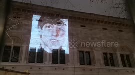 The National Portrait Gallery does a test of a projector on the side of the gallery. It is due to reopen in the next few months. By chance David Bowie is projected on the side of the building on the anniversary of his death