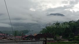 Time-lapse footage shows Mount Marapi spewing white smoke in Indonesia