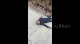 Neighbor holds bat to watch over suspect in break-in at West Hollywood apartment