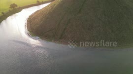 Ancient Silbury Hill in Wiltshire flooded due to heavy rainfall