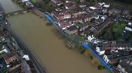 Race to save properties behind flood defences in Worcestershire, England as River Severn bursts its banks
