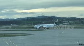 A private plane carrying support for the Iranian protest movement is seen departing Zurich airport