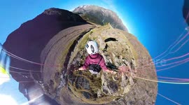 Speed flying pilot flies dangerously close to ground and over mountain