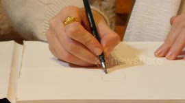 Palestinian architect Walaa Shublaq, 27, draws old buildings to document the antiquities of the Old City