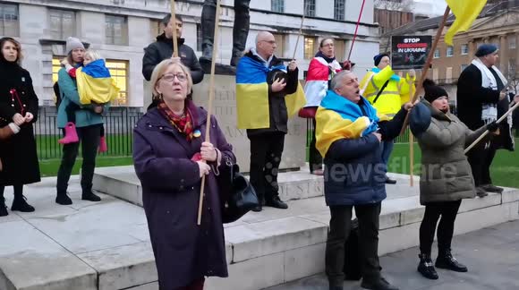 London's Ukrainian community becomes visibly emotional while singing national anthem day after deadly Russian strike